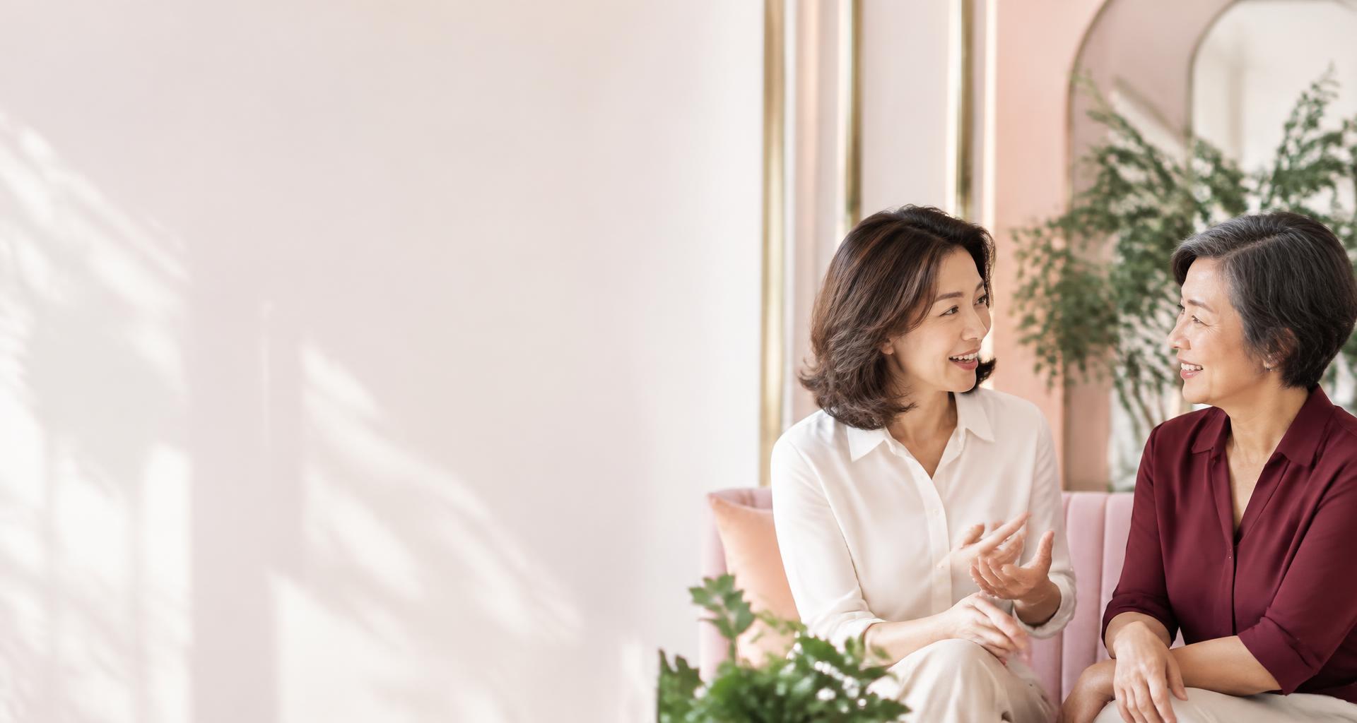Illustrative editorial scene of two women in conversation; not HERSw members or partners